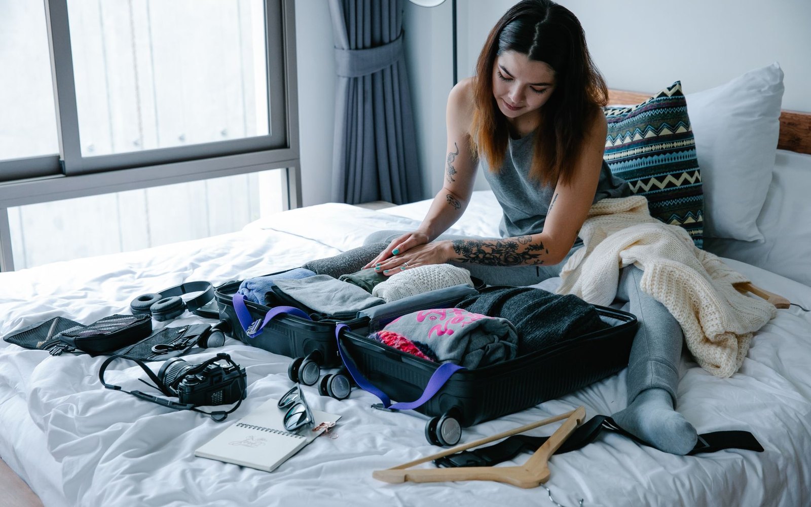 Trip Gear Scout editorial desk with travel gear notes and packing checks